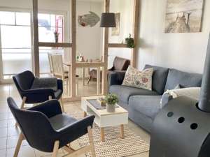 meerZeiten Ferienhaus Hygge Wohnbereich mit Kamin